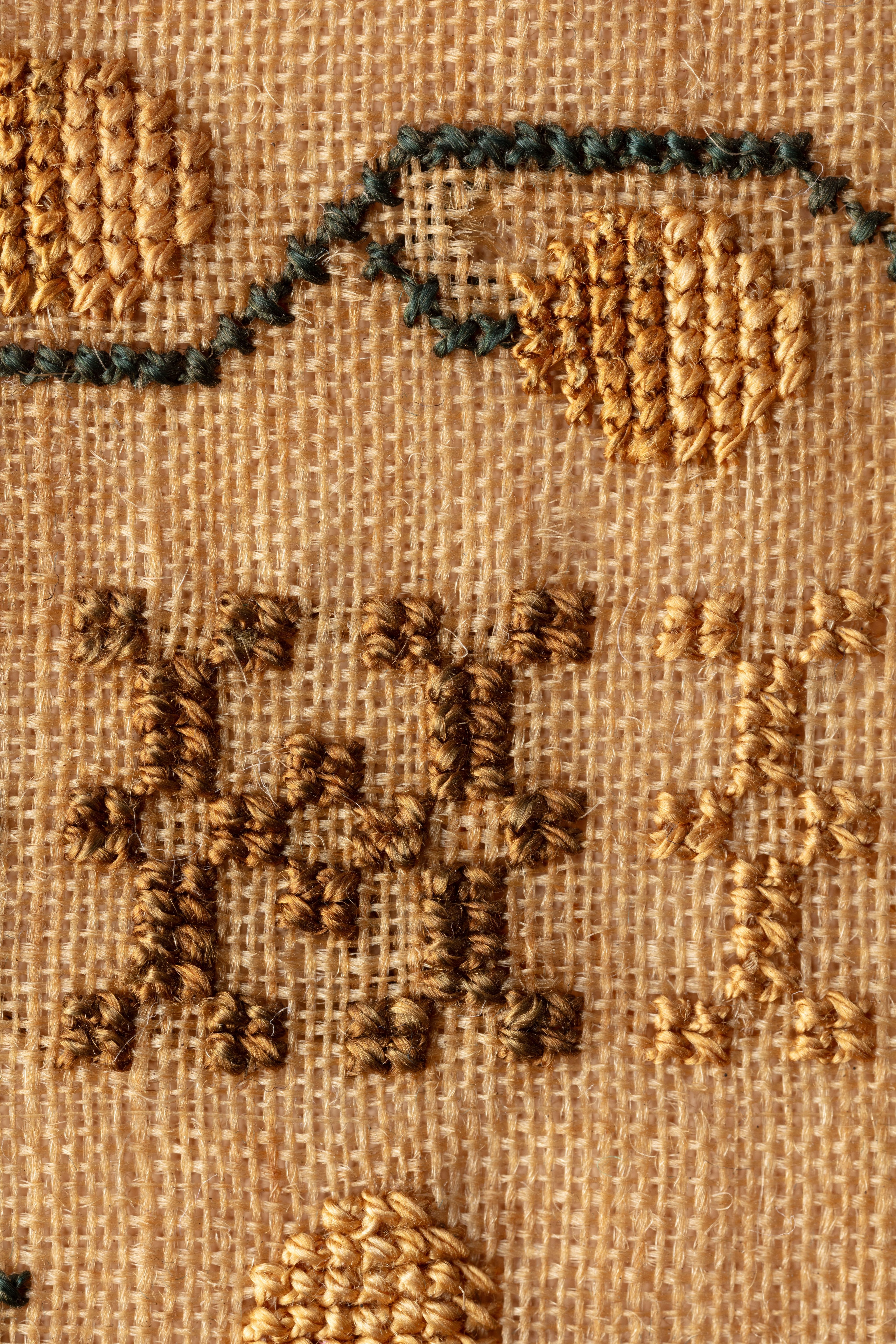 fine cloth, finely stitched sampler with texts, alphabets, numerals, and motifs.