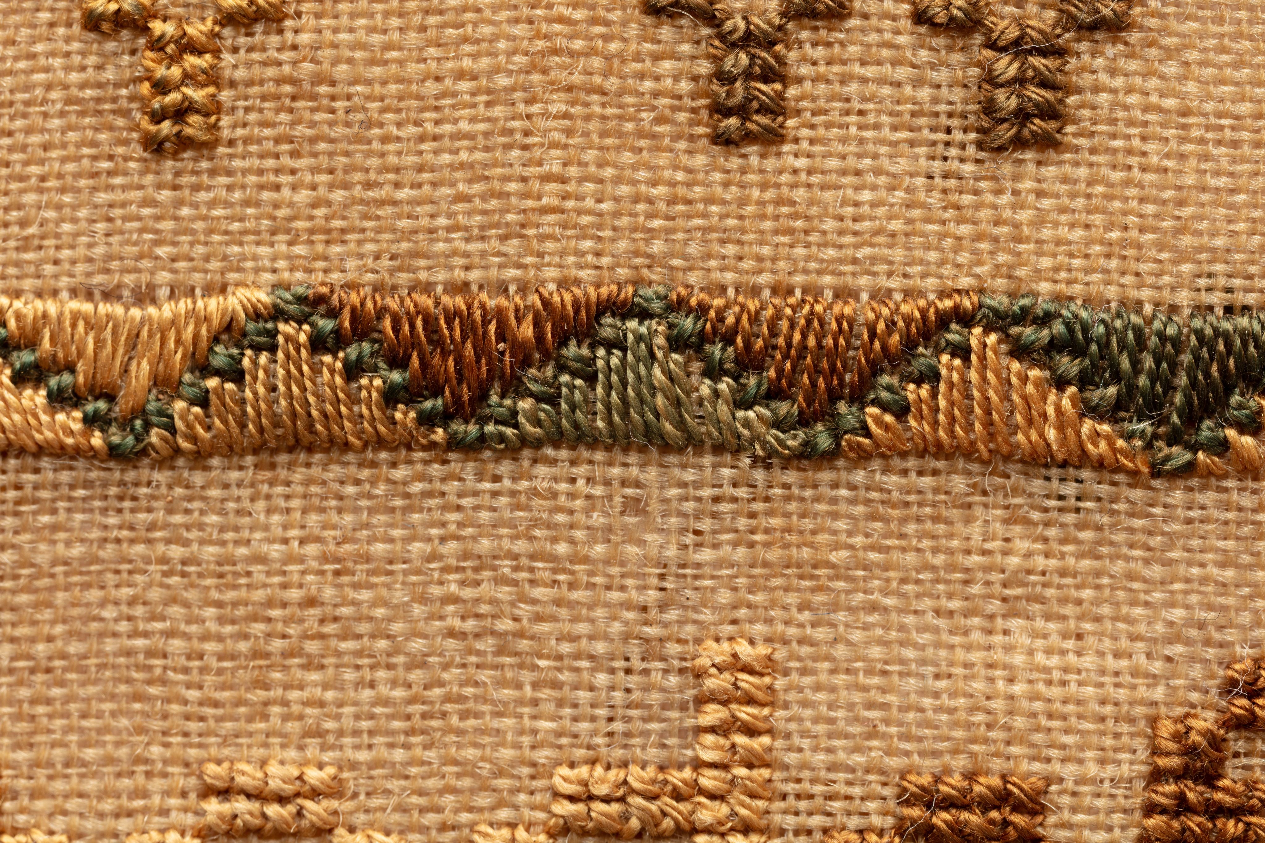 fine cloth, finely stitched sampler with texts, alphabets, numerals, and motifs.